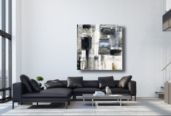 An abstract painting, Concept of Piece- SOLD, hangs in a living room.