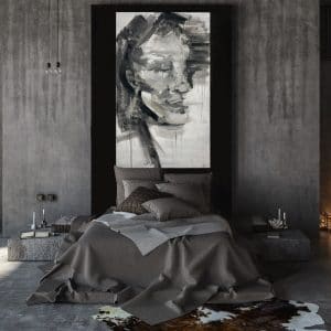 A cozy bedroom with a stunning black and white painting depicting Dreaming of Zion.