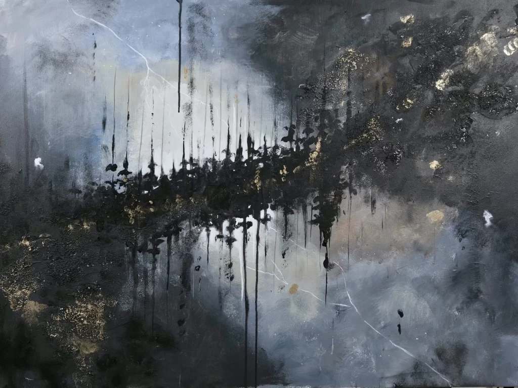 An abstract painting with black and gold drips.