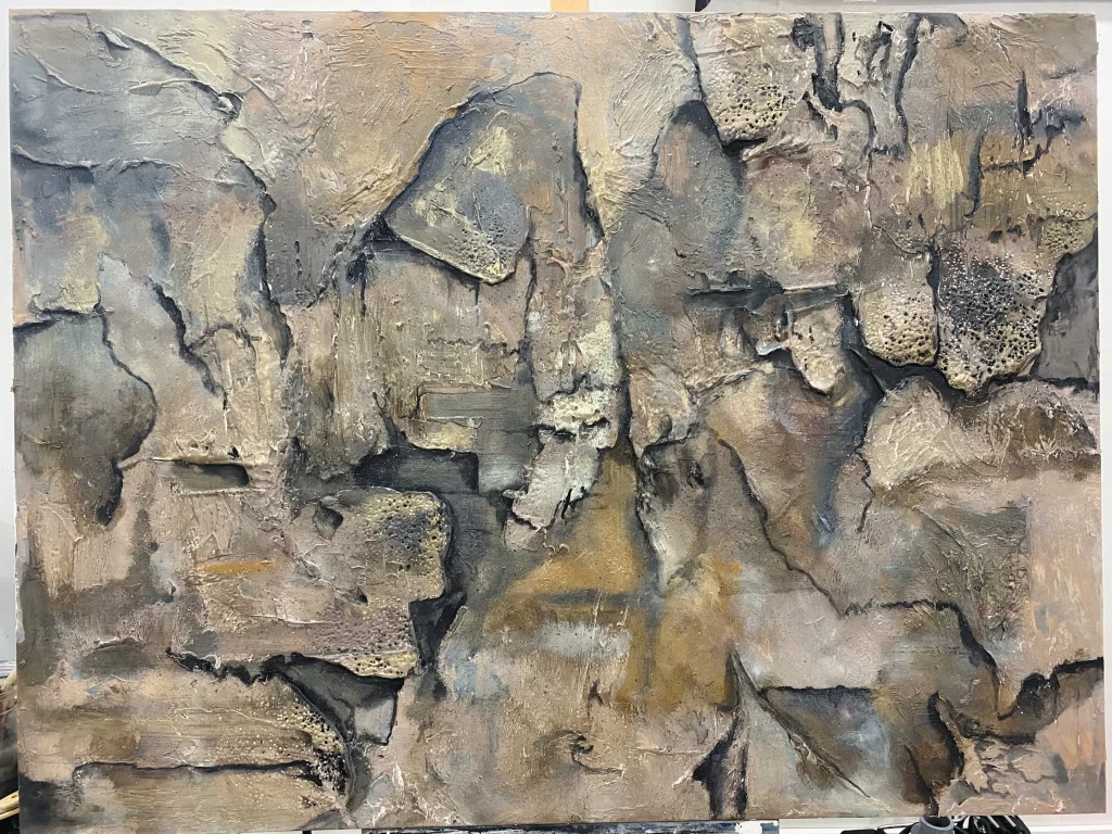 An abstract painting of a rock formation.
